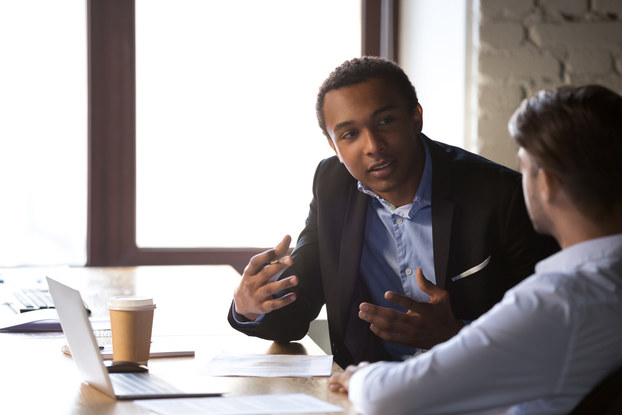 two coworkers in meeting