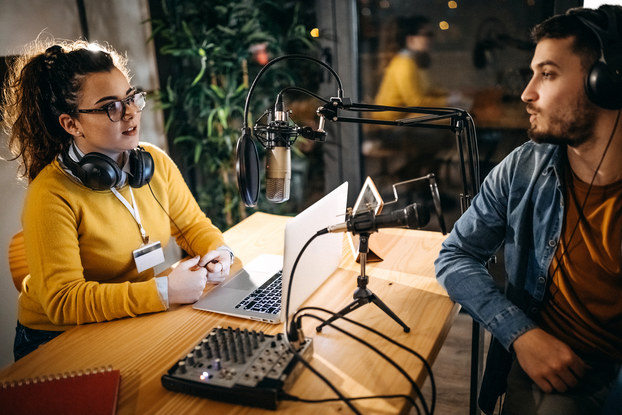 two people recording an interview