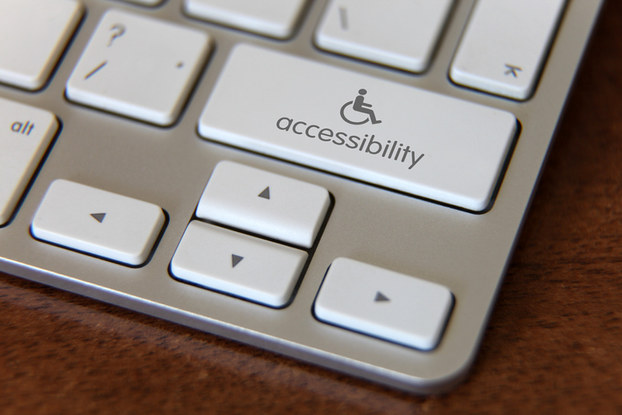 keyboard with handicap accessibility key