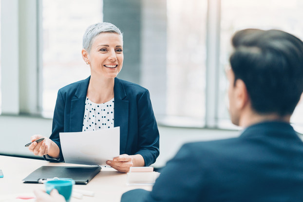 woman interviewing a man