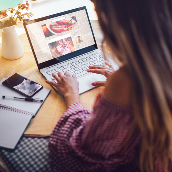 girl sitting at desk on laptop