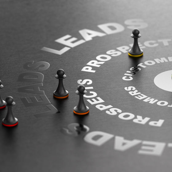 chess pieces on a table with words about prospects and leads