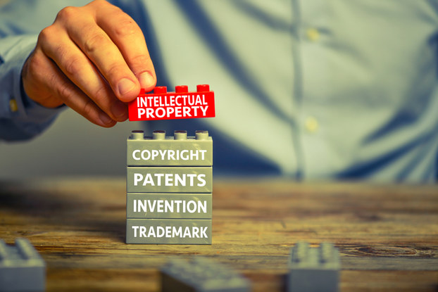 building blocks with words about patents and trademarks