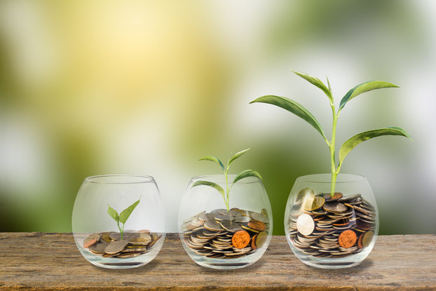 glass cups filled with change