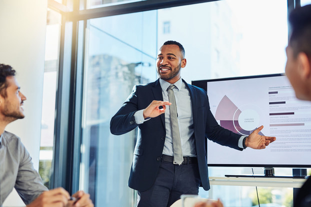man giving a presentation to other coworkers
