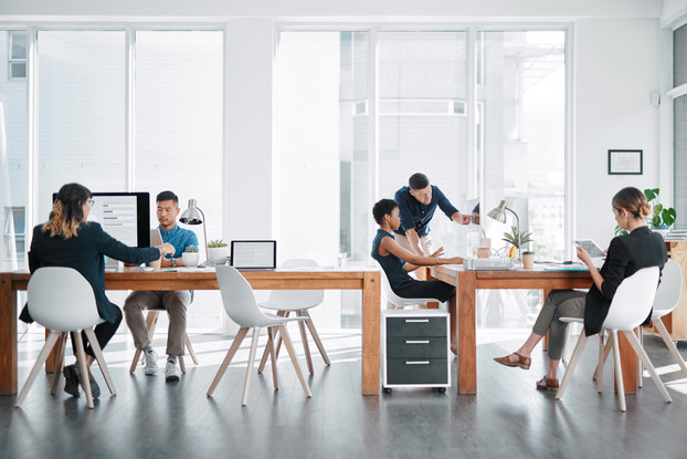 coworkers in a bright office space