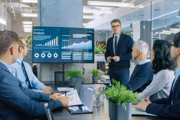 man presenting during a meeting
