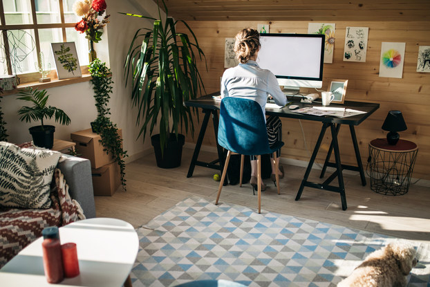 woman working on computer in home