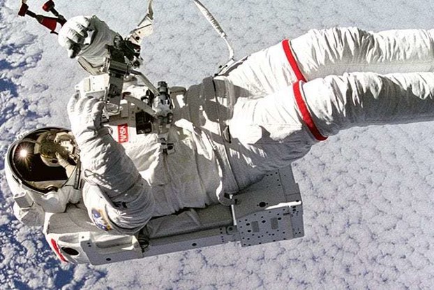 Astronaut floating in space NASA technology