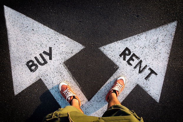person standing on two arrows saying rent and buy
