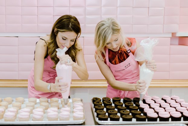 co-founders of georgetown cupcake frosting cupcakes