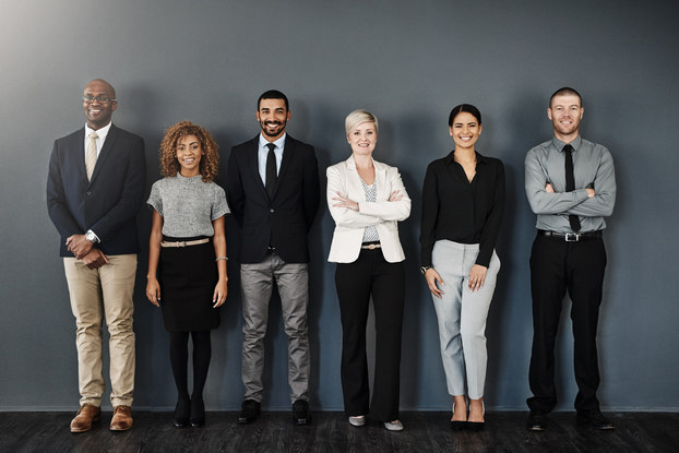 group of coworkers standing in a line