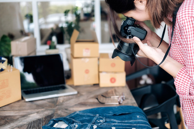 Woman photographing jacket