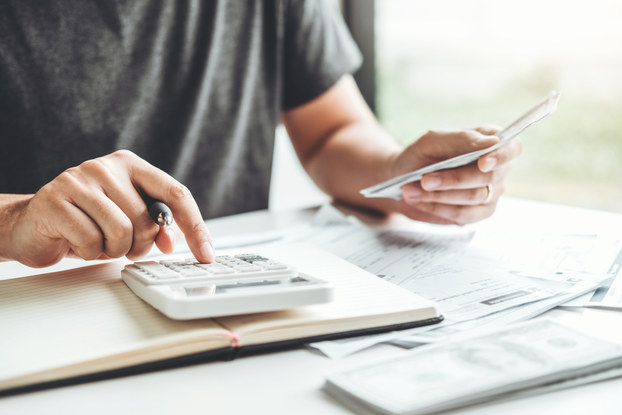 man doing calculations