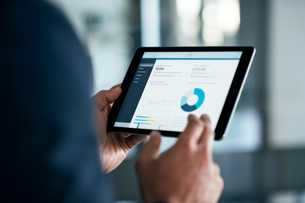 Worker looking at chart on iPad