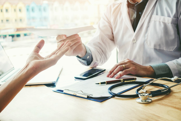 Doctor talking to patient