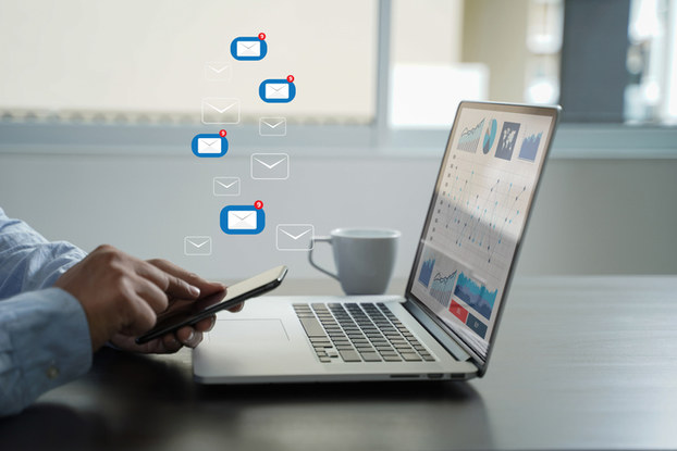 Email envelopes on computer screen