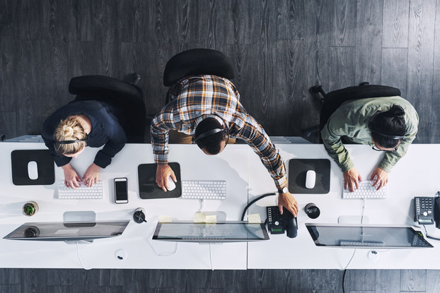 Employees working at desk