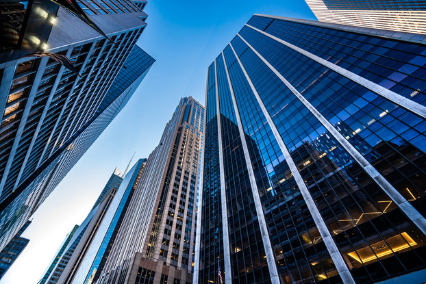 upward-facing image of city buildings
