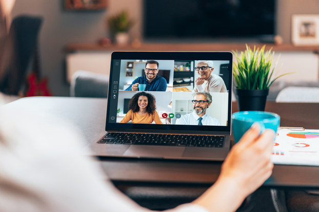 team in virtual meeting on laptop