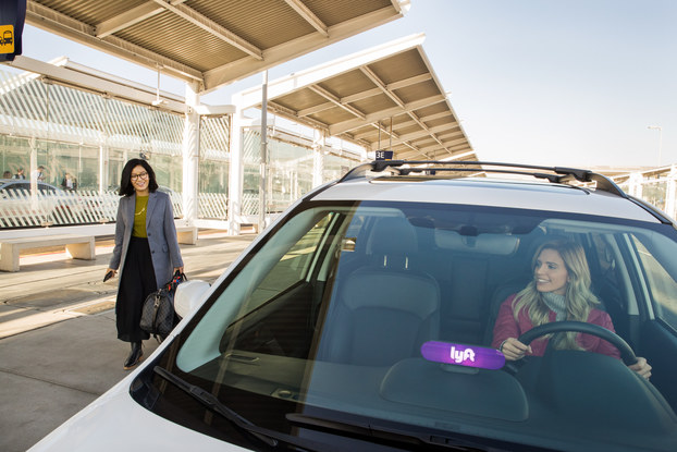 woman getting picked up by lyft
