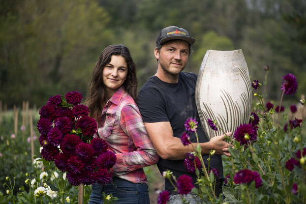 Emily and Josh Copus of Carolina Flowers in their dahlia field.