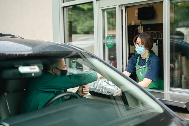 customer at starbucks drive-thru window