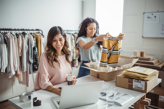 two women working together