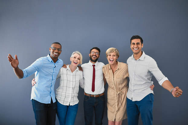 group of co-workers standing in a row