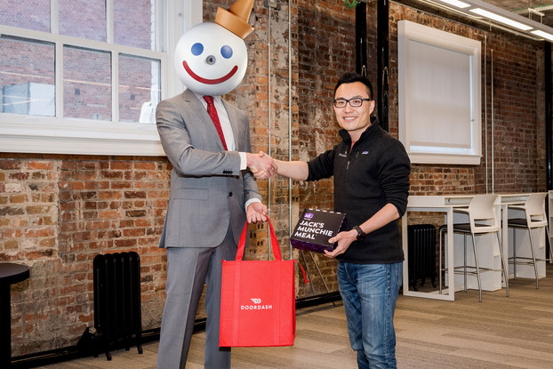Jack in the Box with Door Dash co-founder and CEO Tony Xu. Jack in the Box uses text messaging to drive delivery orders via Door Dash.