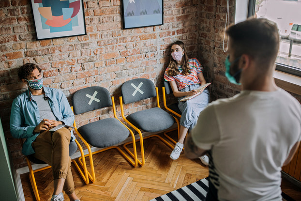socially distanced business meeting
