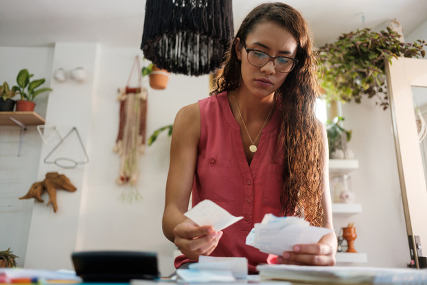 woman going through business receipts
