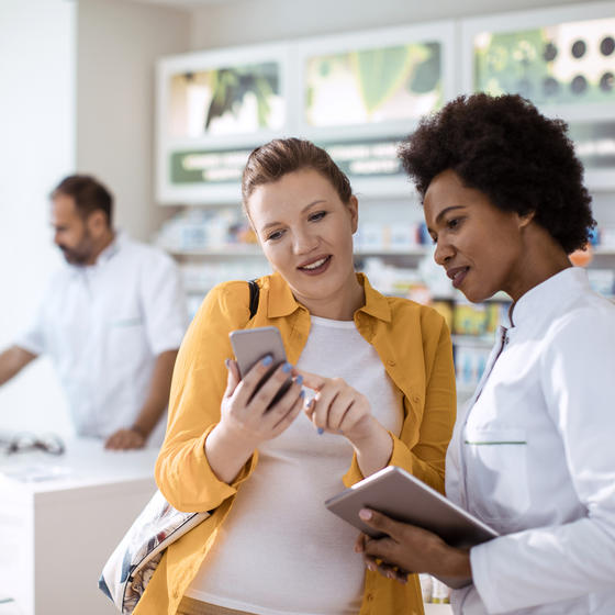 Two customers complete a small business review.