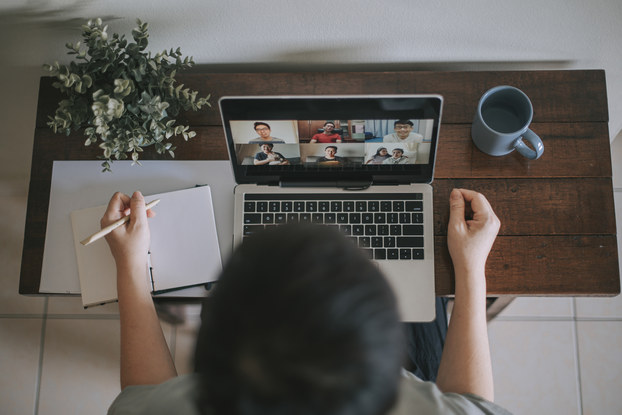 Worker attends remote event.