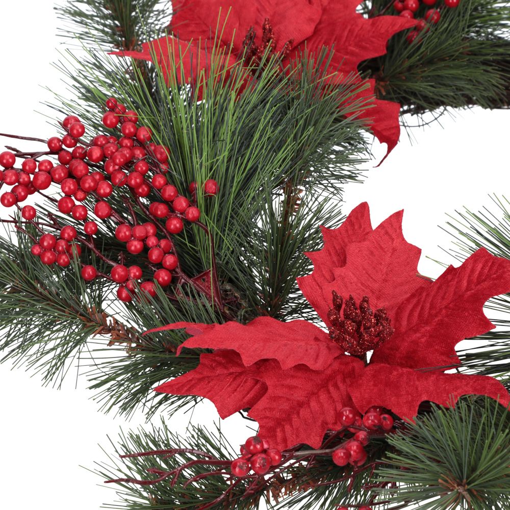 Corona de flores y hojas navideña