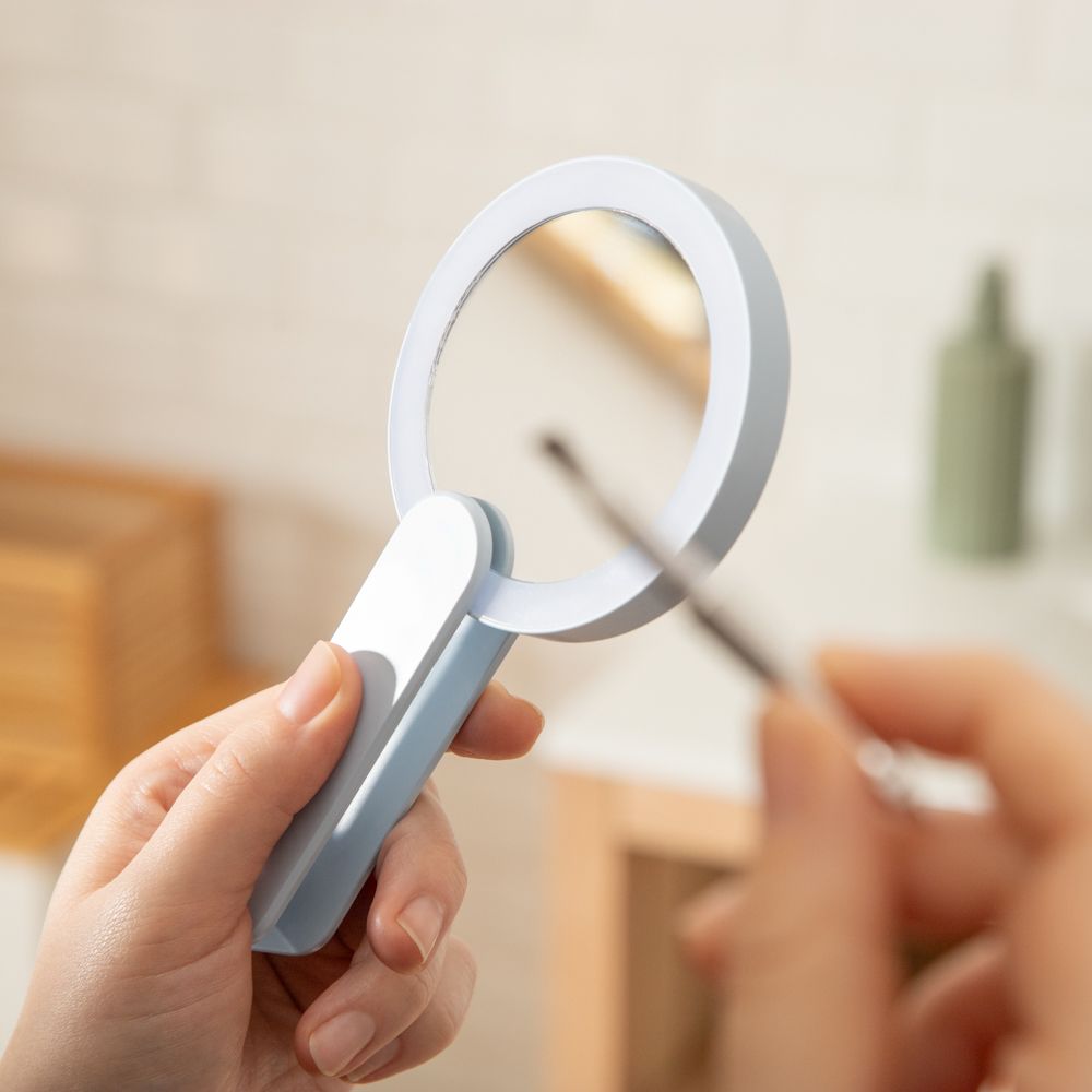 Espejo plegable con luces LED