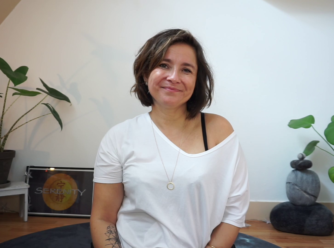 yoga therapy with Biddy in her studio smiling