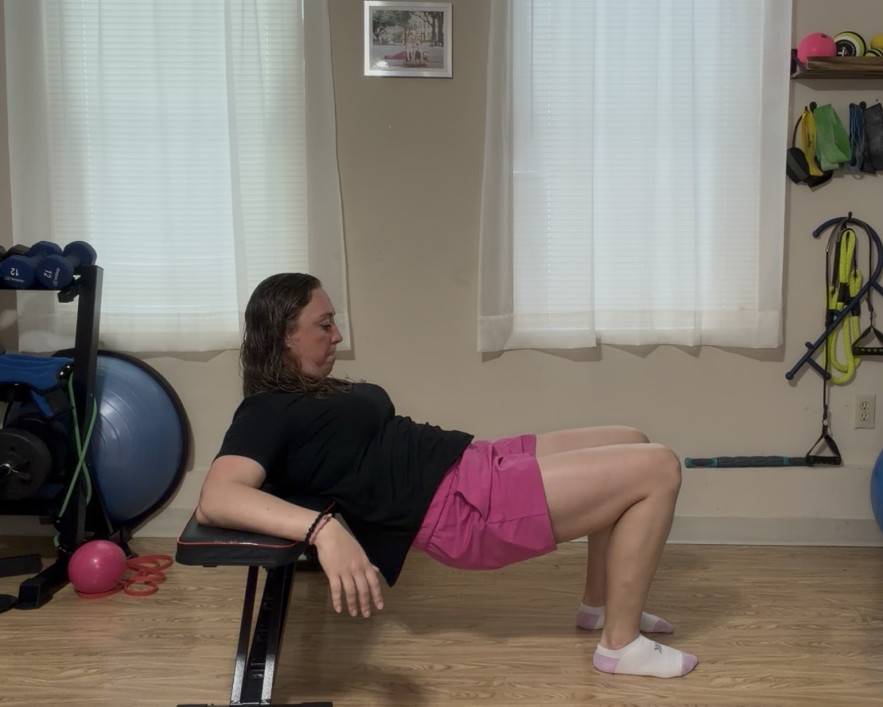 Jen Landry of Moms Fit Life Demonstrating Too much tuck on a hip thrust