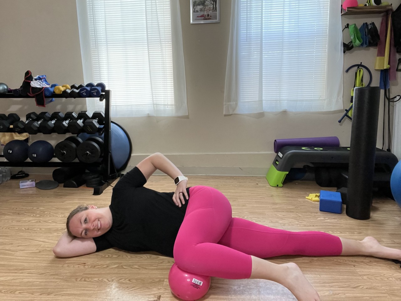Jen of Moms Fit Life demostrating side lying breathing