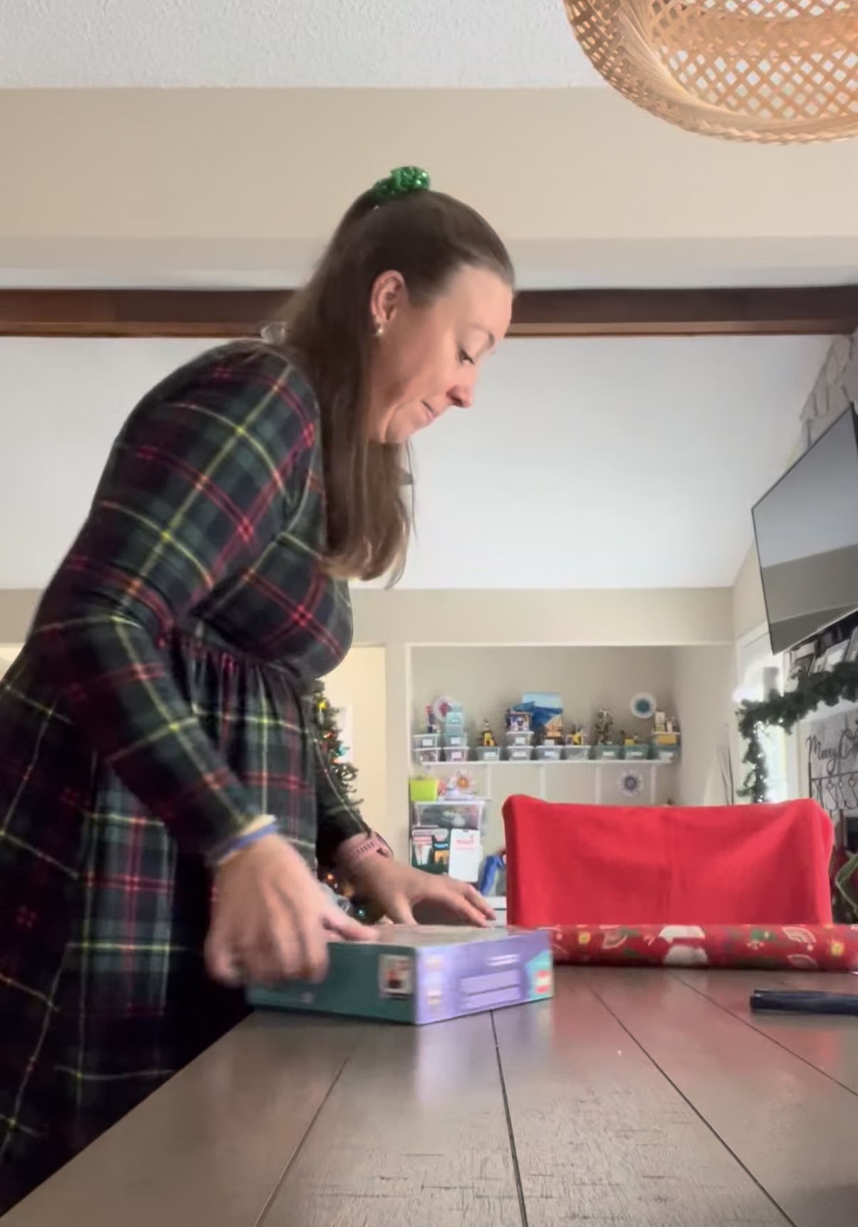 mom wrapping presents