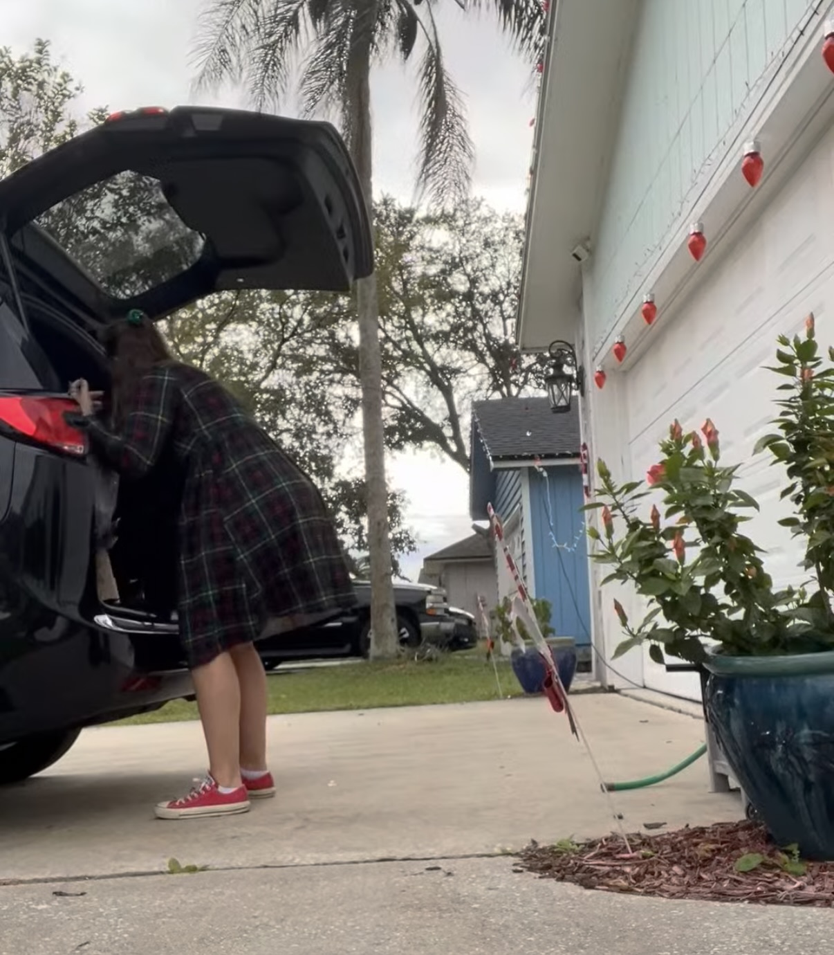 Mom getting things out of the trunk