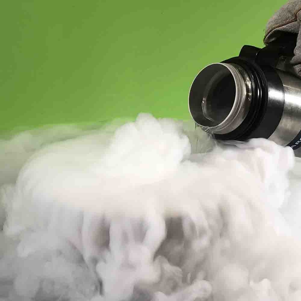Classroom Liquid Nitrogen being poured into a bowl and a cloud pouring over the side of the bowl