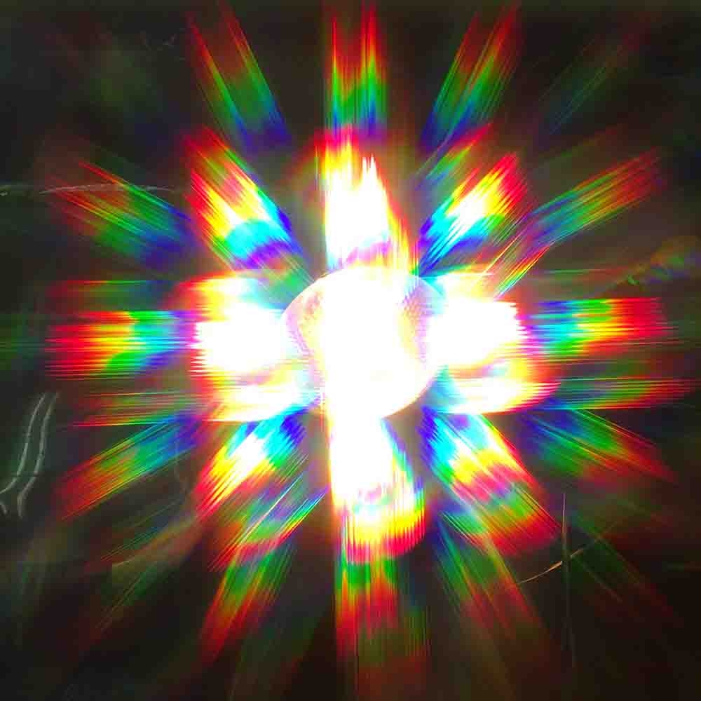 Classroom A star shaped rainbow caused by a diffraction grating splitting white light