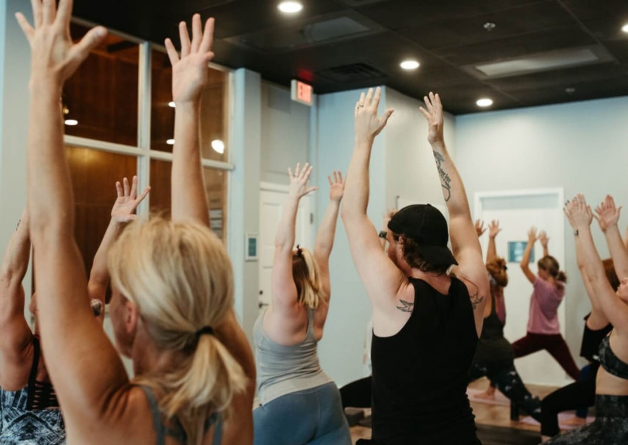 Students practicing yoga during Power to Lead 200-hour teacher training with Dr. Trish Corley in Lisbon