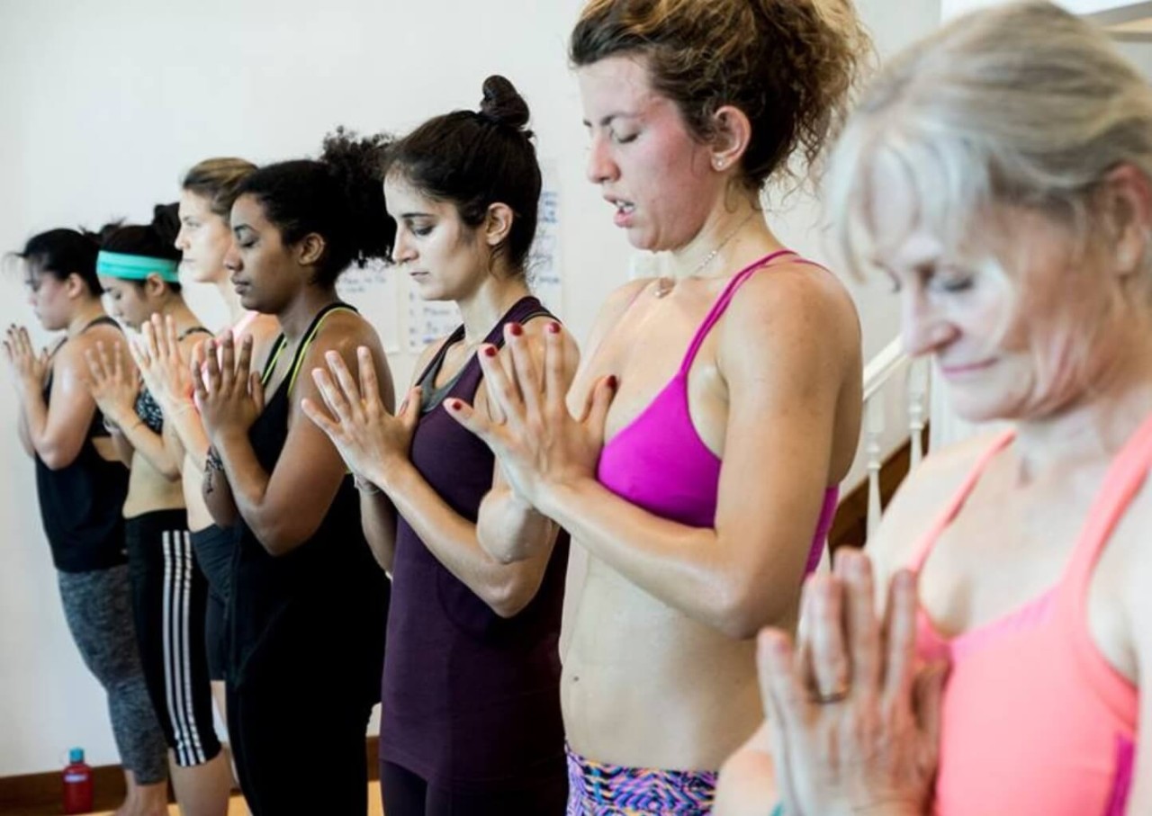 tudents practicing asana during 200-hour yoga teacher training in Lisbon with Dr. Trish Corley