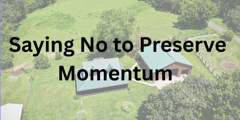 aerial view of a house on land