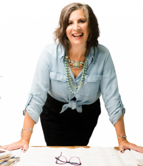 Female leaning over papers to coach STR investors