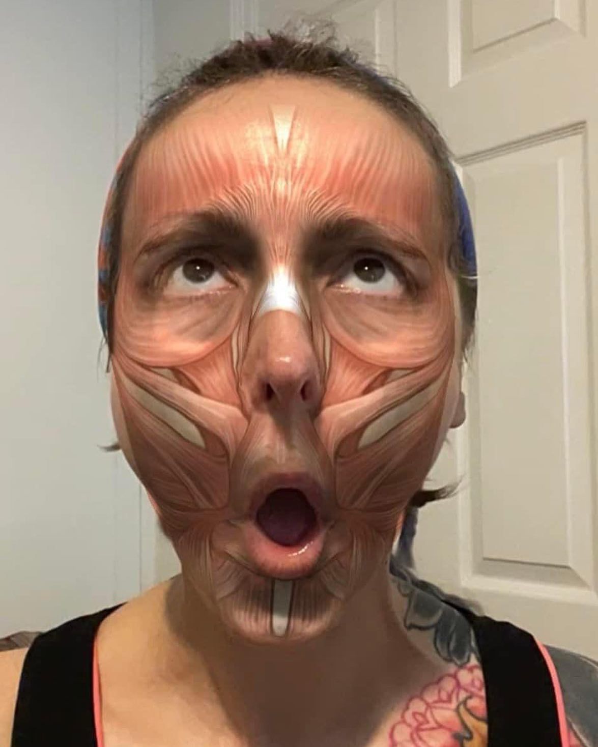 Sarah demonstrating face yoga