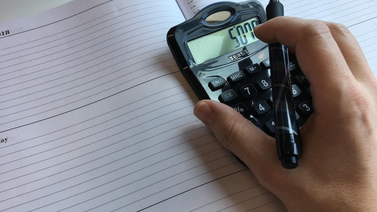 person using a calculator