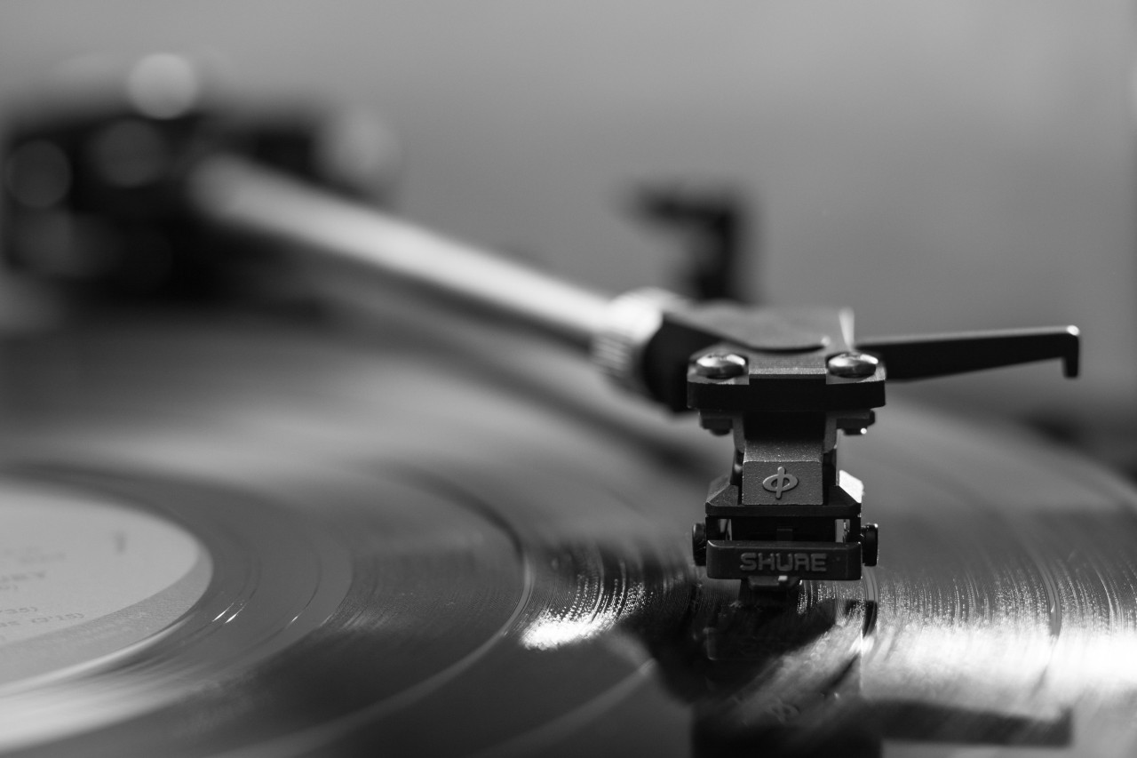 black and white image of record playing